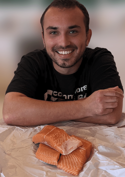 chef with salnmon fillets